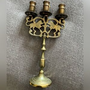 Vintage brass candelabra set with lion motif
